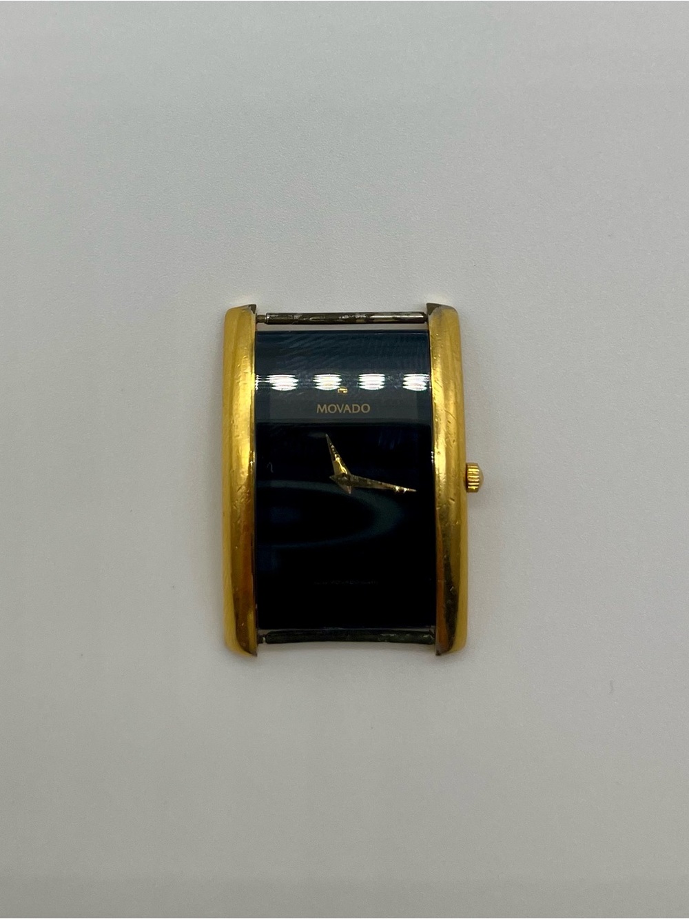 Movado black gold 87.c1.450.2 watch face